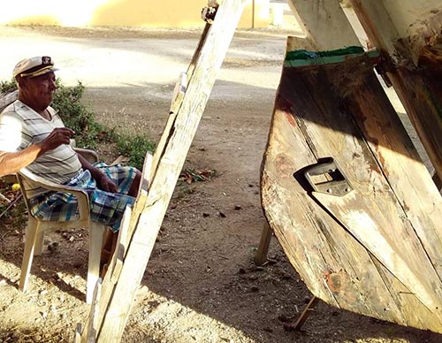 Ismael Soliana is lovingly restoring the traditional sailing vessel, Etienne. Ismael Soliana is lovingly restoring the traditional sailing vessel, Etienne.